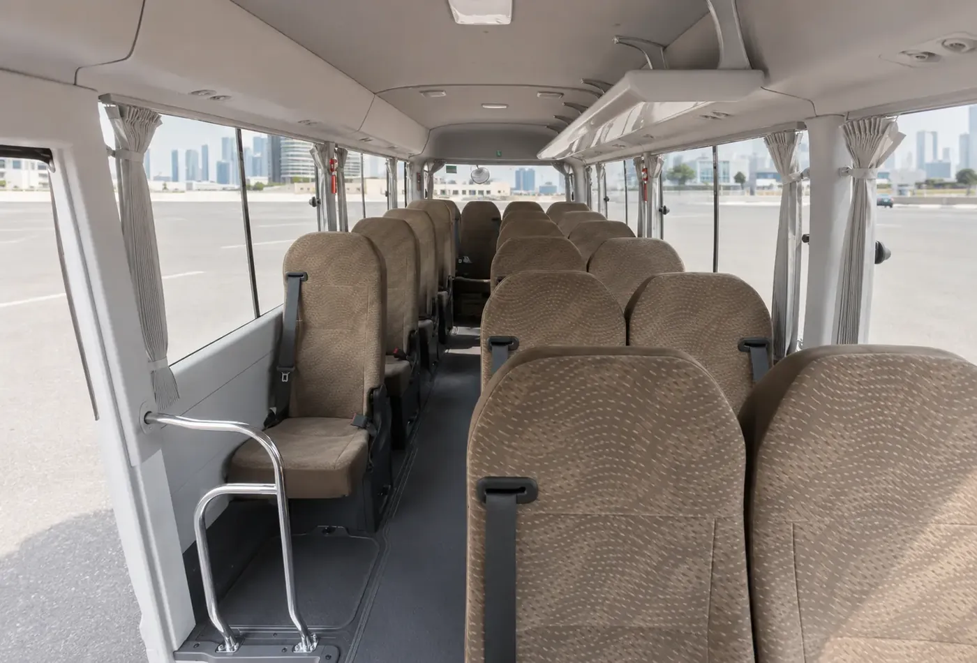 Passenger seating and interior cabin view of a rental minibus