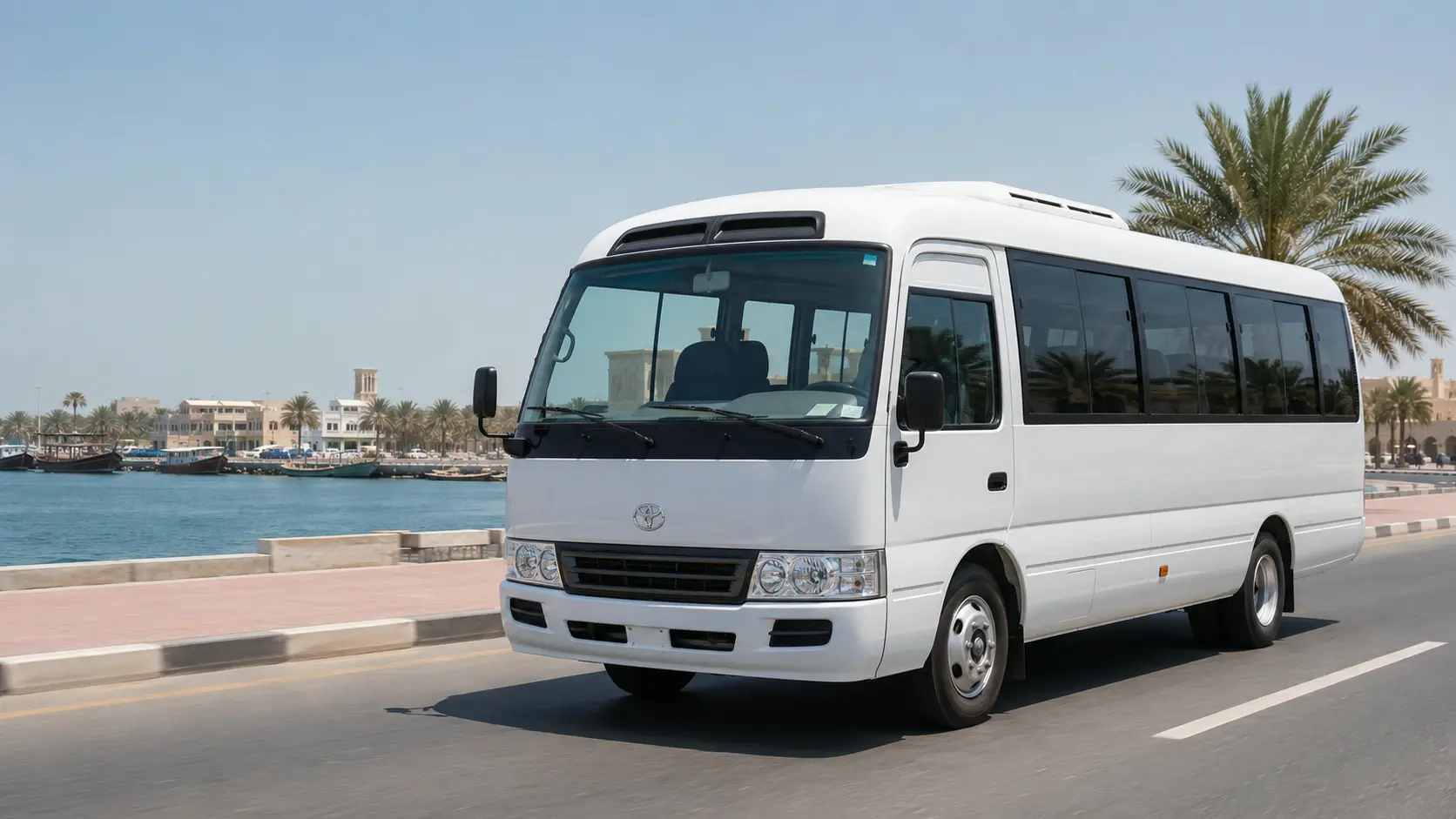 Bus rental Umm Al Quwain with modern coach in UAQ coastal setting